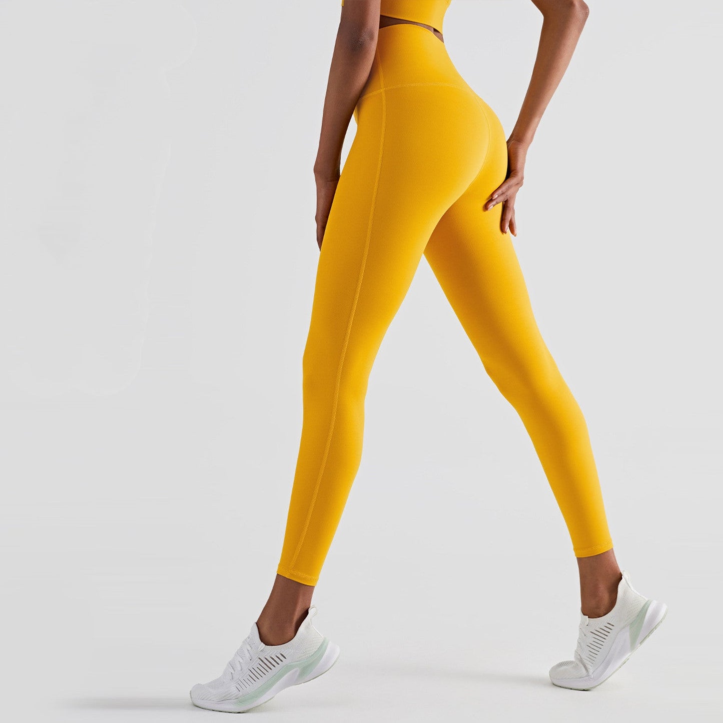 High-waisted Peach Buttocks Fitness Women Wearing Tights With Hips